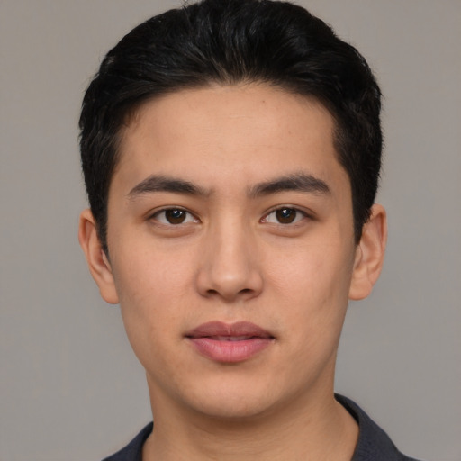 Neutral white young-adult male with short  black hair and brown eyes