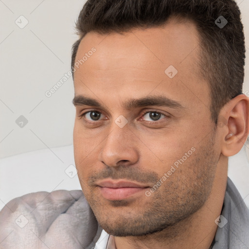 Neutral white young-adult male with short  brown hair and brown eyes