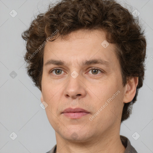 Neutral white adult male with short  brown hair and brown eyes