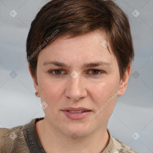 Joyful white young-adult female with short  brown hair and grey eyes