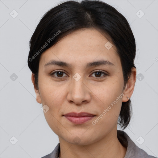 Joyful white adult female with medium  brown hair and brown eyes