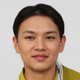 Joyful asian young-adult male with short  brown hair and brown eyes