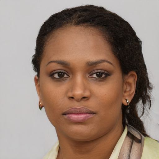 Neutral black young-adult female with short  brown hair and brown eyes