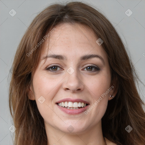 Joyful white young-adult female with medium  brown hair and grey eyes