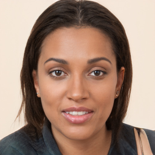 Joyful white young-adult female with long  brown hair and brown eyes