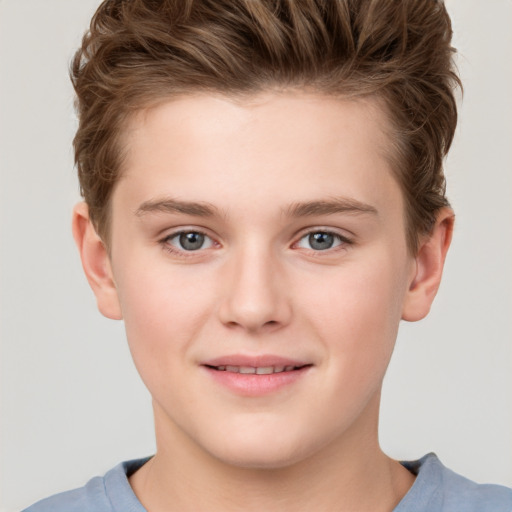 Joyful white child female with short  brown hair and grey eyes