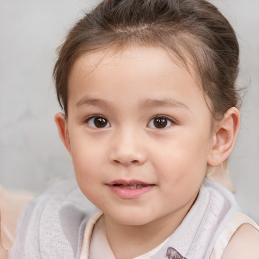 Joyful white child female with short  brown hair and brown eyes