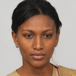 Neutral black young-adult female with short  brown hair and brown eyes