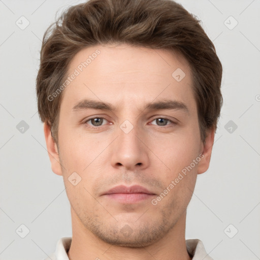 Neutral white young-adult male with short  brown hair and grey eyes