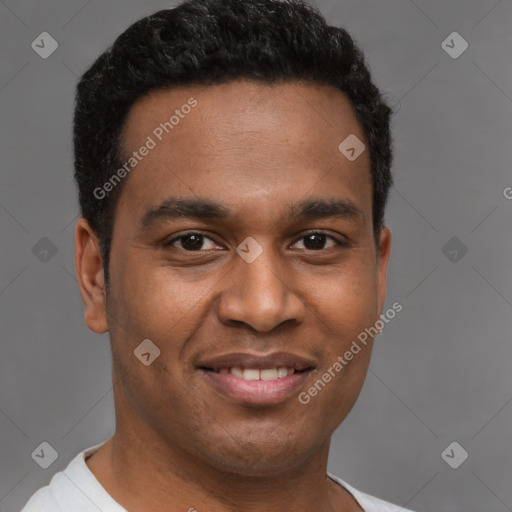 Joyful latino young-adult male with short  brown hair and brown eyes