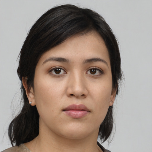 Neutral white young-adult female with medium  black hair and brown eyes