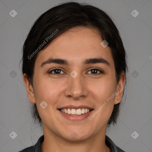 Joyful white young-adult female with medium  brown hair and brown eyes