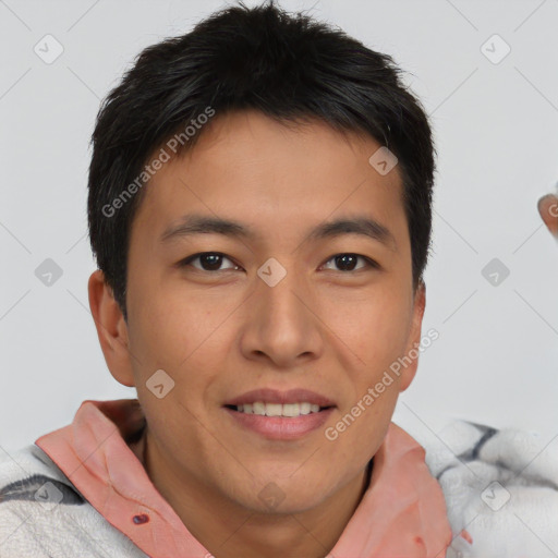 Joyful asian young-adult male with short  brown hair and brown eyes