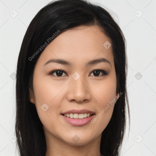 Joyful asian young-adult female with long  brown hair and brown eyes