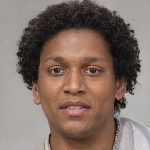 Neutral black young-adult male with short  brown hair and brown eyes