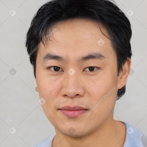 Neutral asian young-adult male with short  black hair and brown eyes