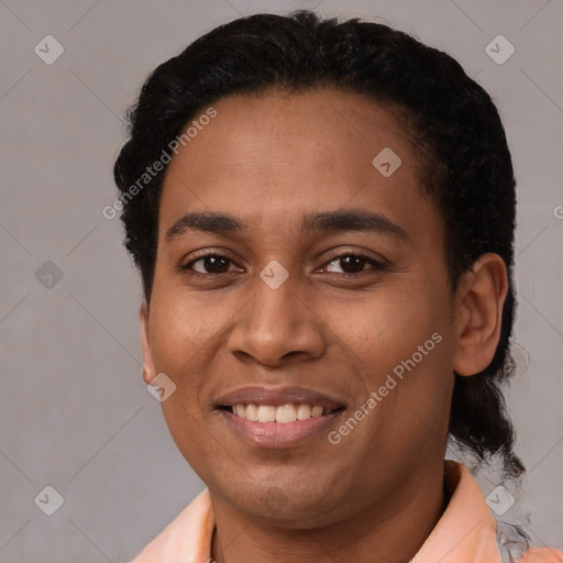 Joyful latino young-adult female with short  black hair and brown eyes