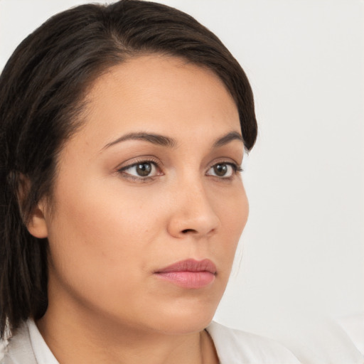 Neutral white young-adult female with medium  brown hair and brown eyes