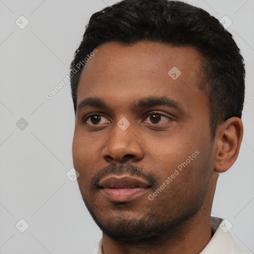 Neutral black young-adult male with short  black hair and brown eyes