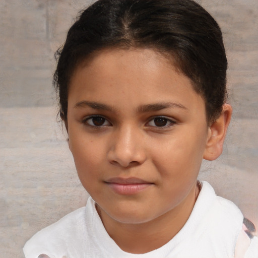 Joyful white child female with short  brown hair and brown eyes