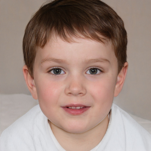 Joyful white child male with short  brown hair and brown eyes