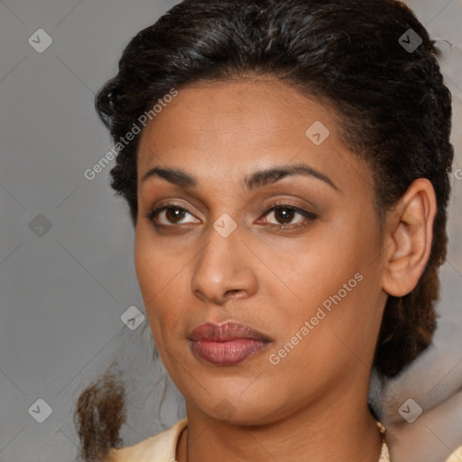 Joyful latino young-adult female with short  brown hair and brown eyes