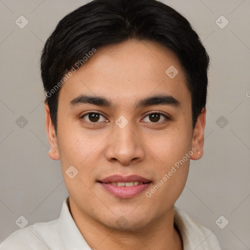 Joyful white young-adult male with short  black hair and brown eyes