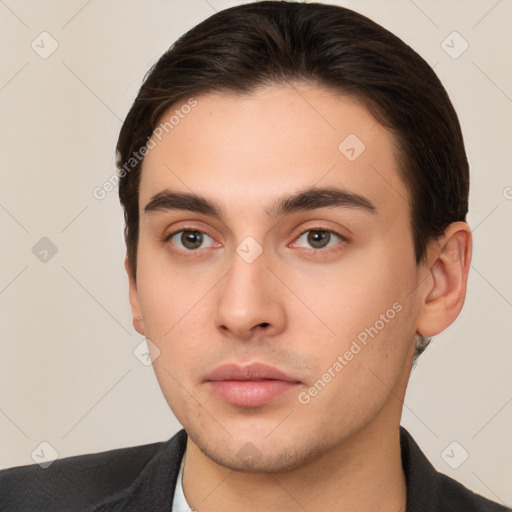 Neutral white young-adult male with short  brown hair and brown eyes