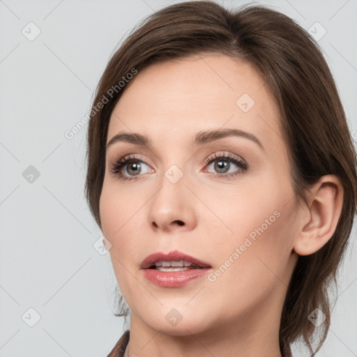 Neutral white young-adult female with medium  brown hair and grey eyes