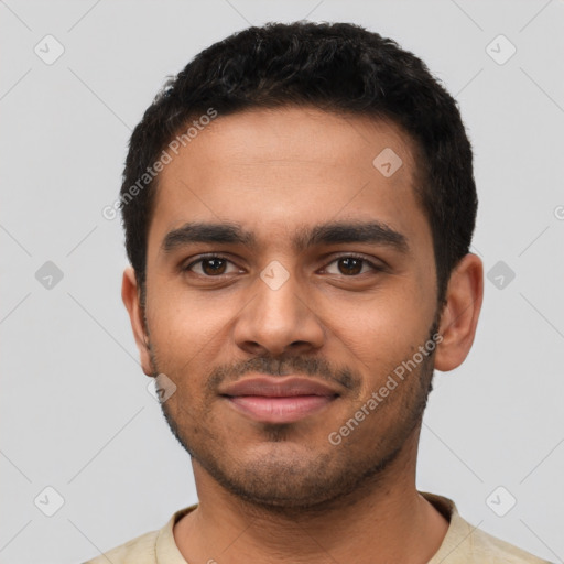 Joyful latino young-adult male with short  black hair and brown eyes