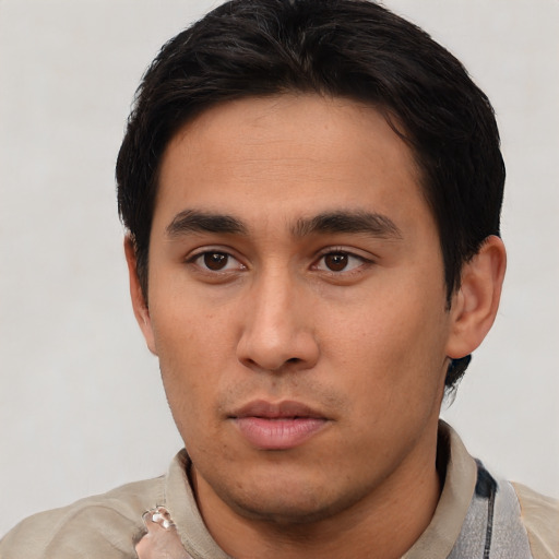 Neutral asian young-adult male with short  black hair and brown eyes