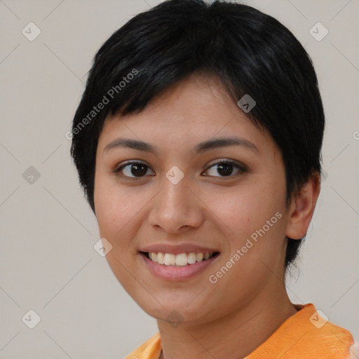 Joyful asian young-adult female with short  brown hair and brown eyes