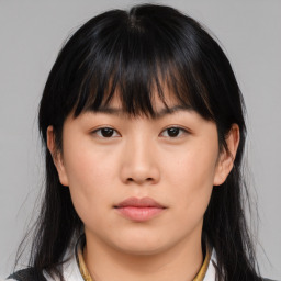 Neutral asian young-adult female with medium  brown hair and brown eyes