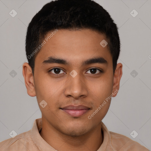 Joyful latino young-adult male with short  brown hair and brown eyes