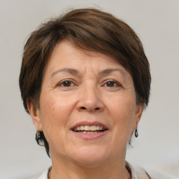 Joyful white adult female with short  brown hair and brown eyes