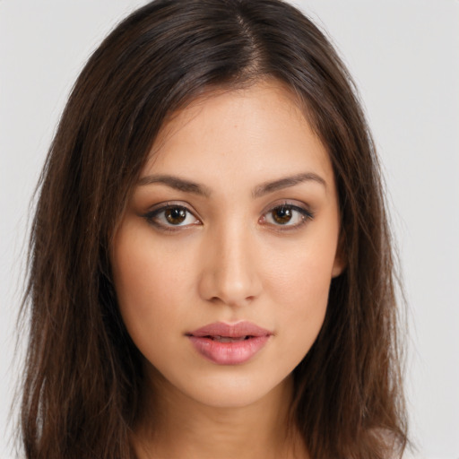 Neutral white young-adult female with long  brown hair and brown eyes