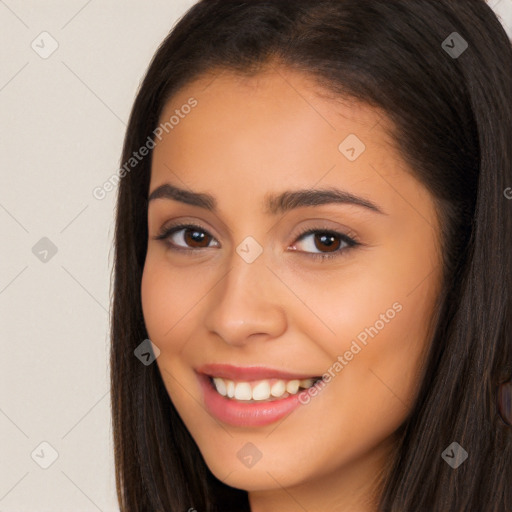 Joyful white young-adult female with long  brown hair and brown eyes