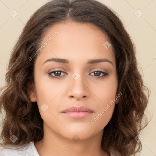 Neutral white young-adult female with long  brown hair and brown eyes