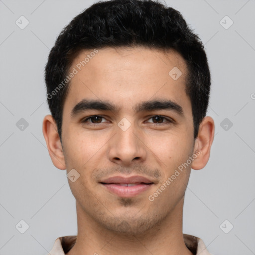 Joyful white young-adult male with short  black hair and brown eyes