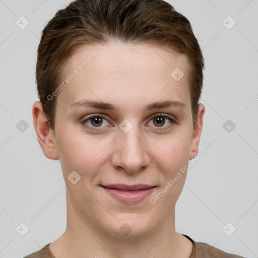 Joyful white young-adult female with short  brown hair and grey eyes