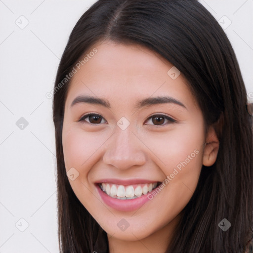 Joyful white young-adult female with long  brown hair and brown eyes