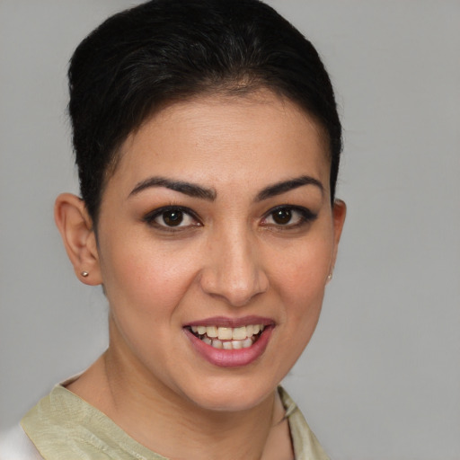 Joyful white young-adult female with short  brown hair and brown eyes