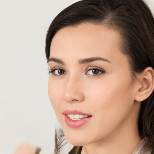 Neutral white young-adult female with medium  black hair and brown eyes