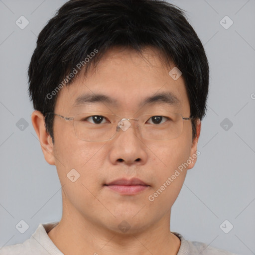 Neutral asian young-adult male with short  brown hair and brown eyes