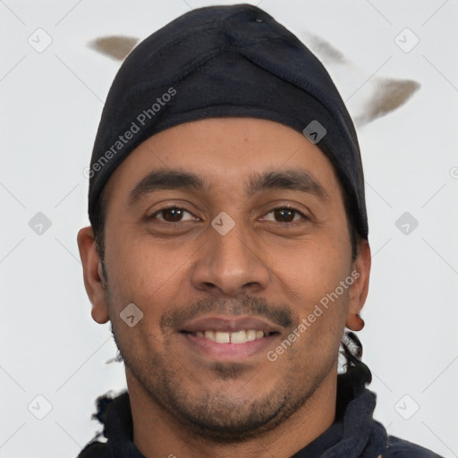 Joyful white young-adult male with short  black hair and brown eyes