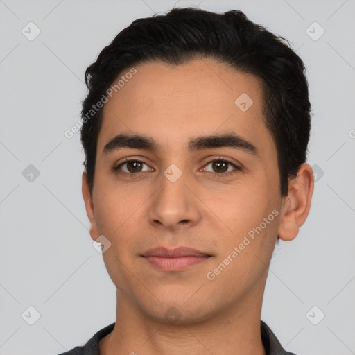 Neutral latino young-adult male with short  black hair and brown eyes