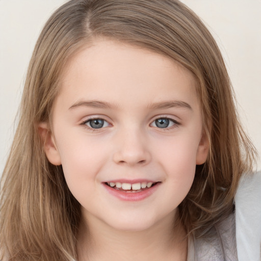 Joyful white child female with medium  brown hair and brown eyes