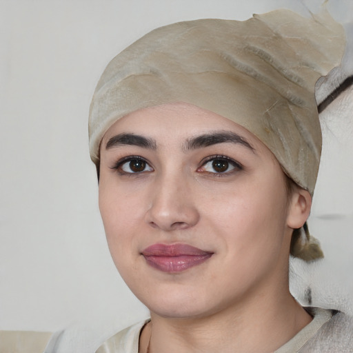 Joyful white young-adult female with medium  black hair and brown eyes