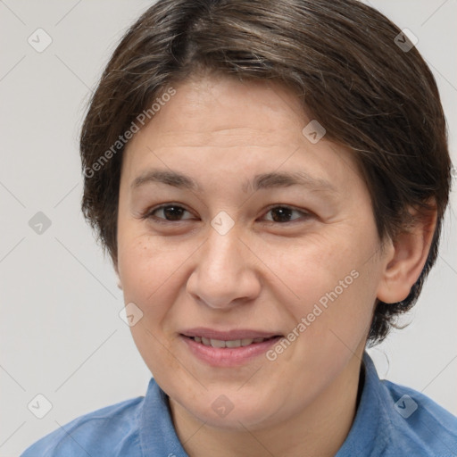 Joyful white adult female with medium  brown hair and brown eyes