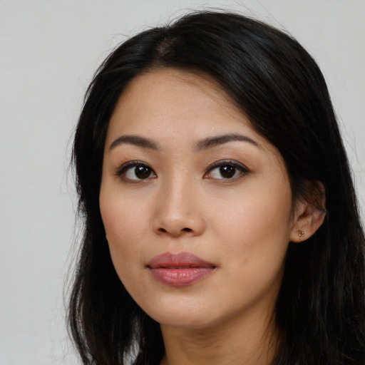 Neutral latino young-adult female with long  black hair and brown eyes